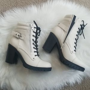 Brand new womens boots with side zipper